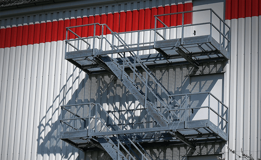 Best fire escape materials for NYC weather including galvanized steel, stainless steel, and aluminum structures designed for durability and safety