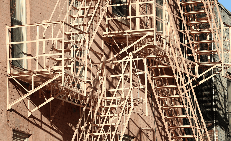 Best materials for long lasting fire escapes in NYC, showing durable steel and metal stair structures used for safe emergency exits.