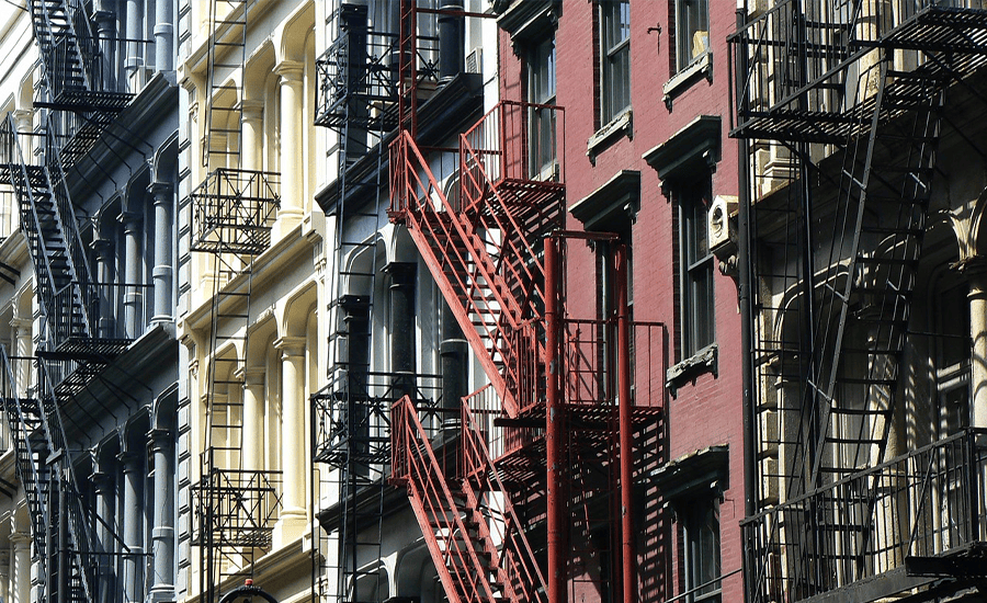 Modern fire escape replacement in NYC building with safe and durable design installed by licensed contractors.