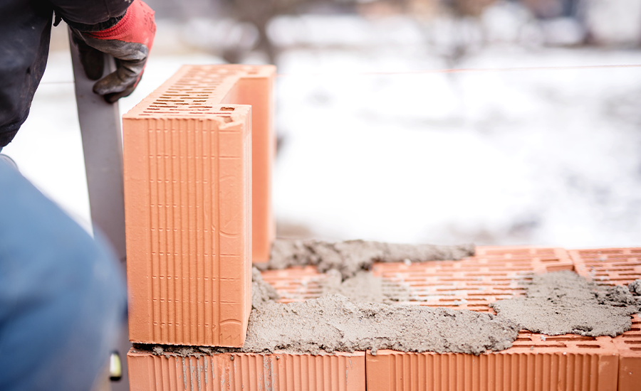 Cold weather masonry problems and fixes for bricks, mortar, and concrete in NYC winter conditions