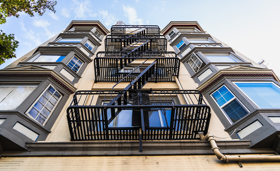 NYC fire escape covered in winter snow with safe, clear access for emergency use