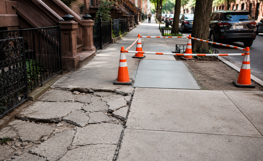 DOT sidewalk violation repair inspection on a damaged NYC sidewalk